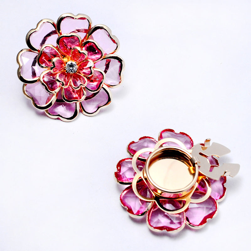 Gemelos y broche florales con pedrerĂa elegante