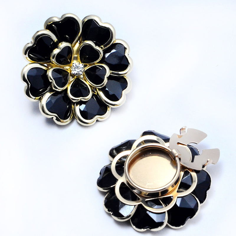 Gemelos y broche florales con pedrería elegante