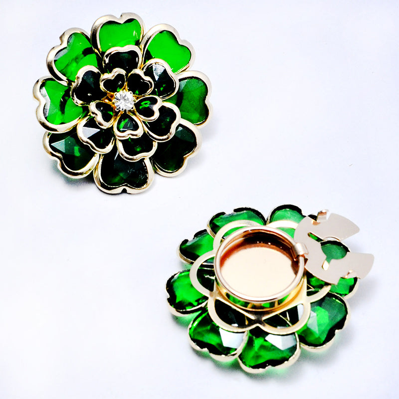 Gemelos y broche florales con pedrería elegante