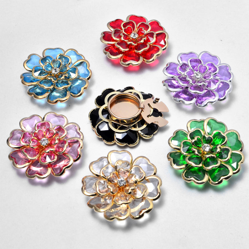 Gemelos y broche florales con pedrería elegante