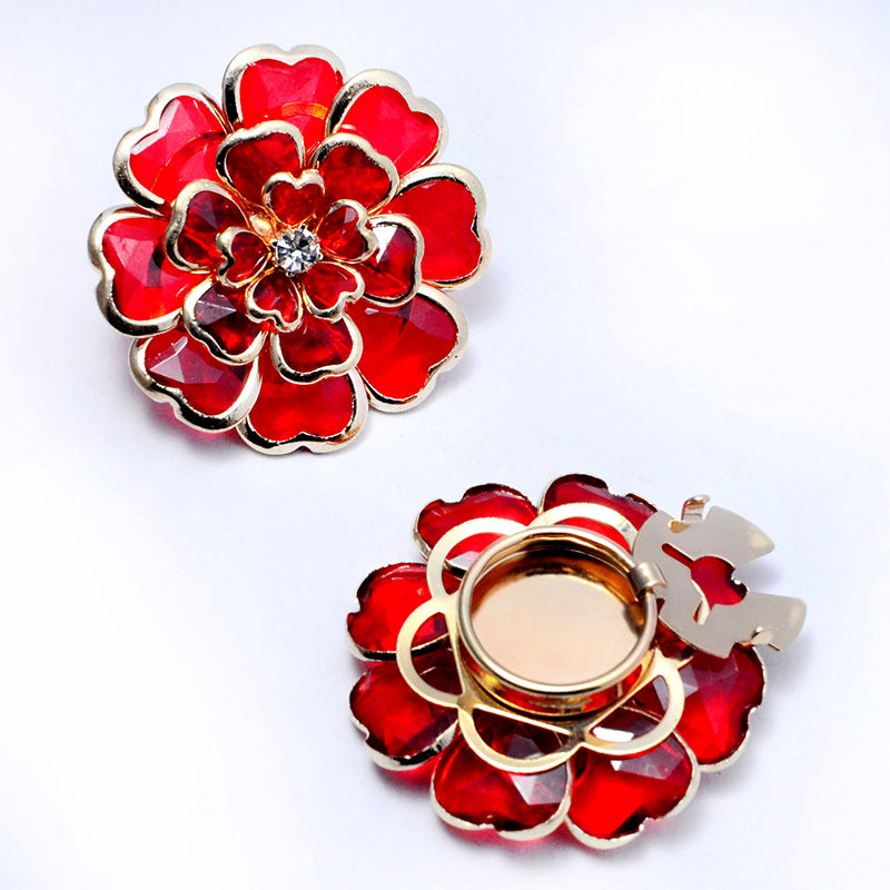 Gemelos y broche florales con pedrería elegante