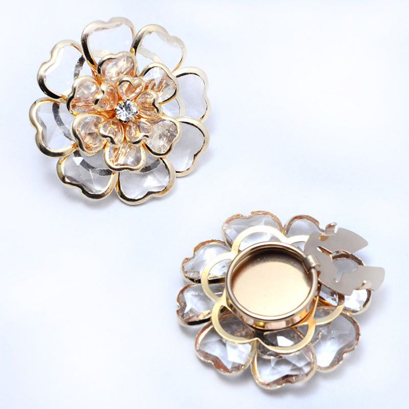 Gemelos y broche florales con pedrería elegante