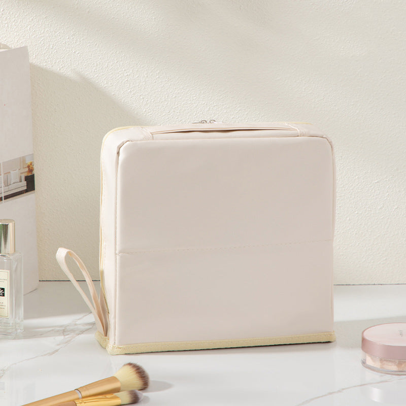 Bolsa de cosméticos portátil y con compartimentos elegante