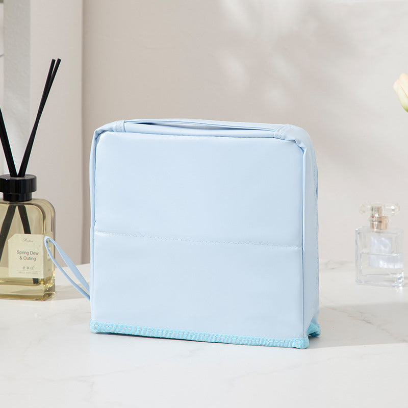 Bolsa de cosméticos portátil y con compartimentos elegante