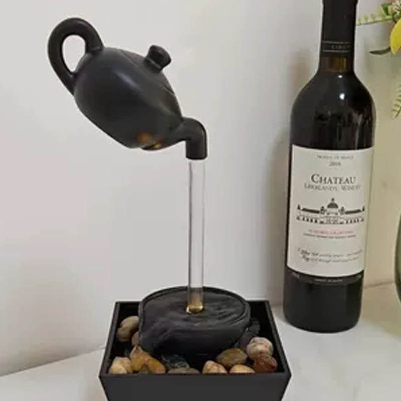 50% DE DESCUENTO! Decoración de Fuente de Tetera con Ilusión Flotante – Efecto Óptico Sorprendente, Bomba Recirculante y Relajante Sonido de Agua 🌊🏡